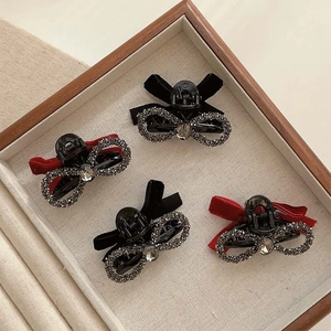 Luxe velvet bow hair clips with rhinestones in red and black colors for women