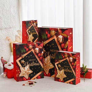 Extra large Christmas gift bags with gold foil lettering and festive reindeer designs