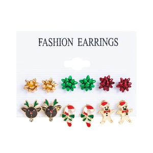 6-pair set of Christmas earrings featuring Santa, elk, and tree motifs in festive enamel