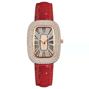 Elegant rose gold women's watch with rhinestone bezel and red crocodile leather strap