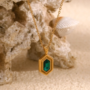 18K gold plated necklace with hexagonal emerald green stone pendant and textured gold frame