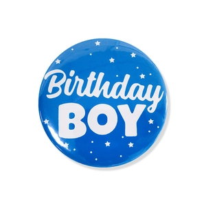 Blue tinplate badge with Birthday BOY text and star patterns for gender reveal party