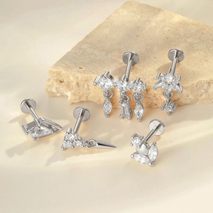 Five-piece silver titanium labret set with heart and flower shapes inlaid with clear zircon