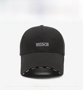 Detail of PARIS FRENCH embroidery on black baseball cap with SPORT inner brim tape