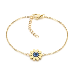 Golden sunflower bracelet with blue evil eye stone inlay on white background