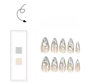 Detailed view of almond fake nails with 3D silver liquid metal and rhinestones