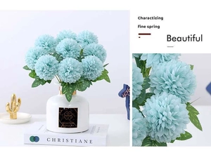 Light blue artificial pompon mum bouquet in white ceramic vase with detailed petals