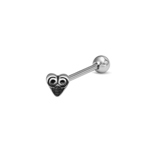 Macro view of polished heart-shaped skull tongue barbell made of surgical steel