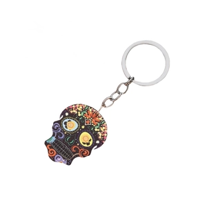 Acrylic sugar skull keychain with colorful floral patterns and a metal ring for Halloween
