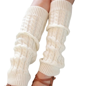 Chic cream white knit leg warmers with classic twist cable pattern for winter