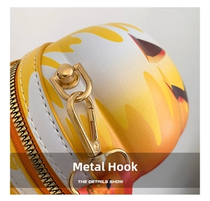 Close-up of premium golden metal hook and zipper on cartoon crossbody bag details