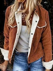 Close-up of caramel corduroy jacket with white fleece lining and metal button details
