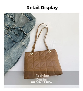 Detail of brown quilted shoulder bag with gold chain strap and PU leather texture