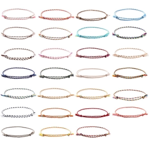 Set of 27 colorful bohemian handmade woven friendship bracelets with adjustable cords
