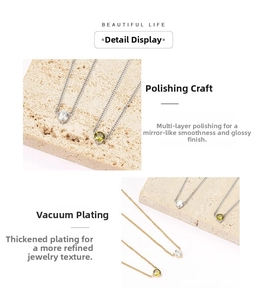Macro detail of polished gold and silver necklaces with sparkling zircon heart pendants