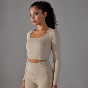Detail of high-stretch seamless yoga top with honeycomb texture and elegant square neckline