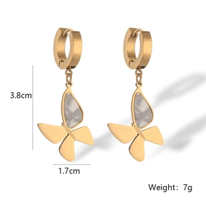 Detailed view of gold butterfly earrings with dimensions 3.8cm and 1.7cm and weight 7g