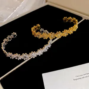Elegant hollow floral open bracelet in gold and silver finish with daisy pattern