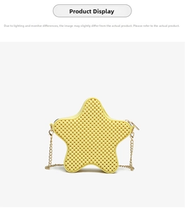 Macro shot of yellow star-shaped jelly bag with beaded texture and gold chain strap