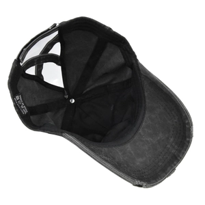 Internal view of vintage ponytail baseball cap showing 100% cotton label and stitching
