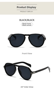 Detail view of vintage oversized black sunglasses with silver metal accents on the temples