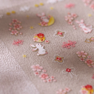 3D bronzing nail stickers with rabbit, cherry blossom, and lantern designs