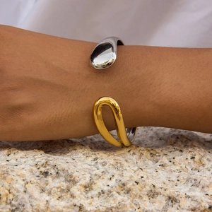 Two-tone gold and silver stainless steel open bangle with teardrop and oval link design
