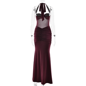 Detailed back view of burgundy ruched maxi dress featuring a halter neck and mesh detail