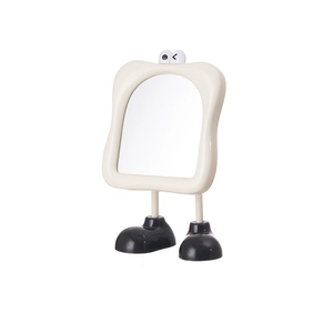 Creative foot-shaped desk makeup mirror with cartoon eyes and beige plastic frame