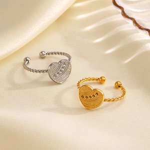 Adjustable twist rope heart ring with pavé crystals in gold and silver finish