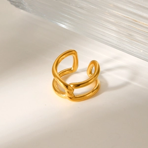 Polished gold plated stainless steel knot cross ring in a minimalist geometric design