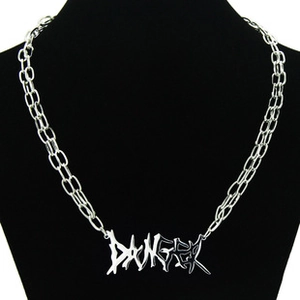 Close-up of titanium steel O-chain necklace with DANGER graffiti pendant on black bust