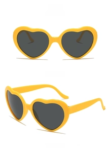 Front and side view of gold heart-shaped sunglasses with dark grey tinted lenses