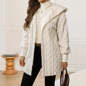 Close-up of cream hooded cardigan with rich cable knit texture and fuzzy finish