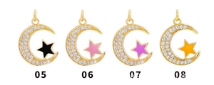 Detail of 18K gold plated moon pendants with colorful enamel stars and zircon stones