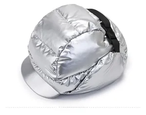 Top view of silver metallic quilted winter hat with adjustable buckle strap detail