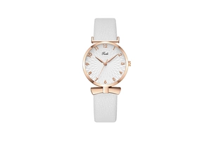 Close-up of rose gold watch case with bow detail and white leather strap on white background