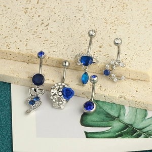 5-piece set of silver navel rings with blue planet, heart, and star zircon designs
