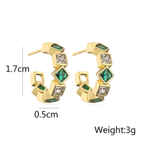 Detailed view of green zircon gold earrings with dimensions 1.7cm and weight 3g