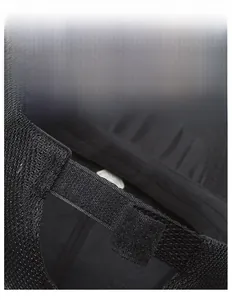Detail of adjustable strap and breathable mesh on black men's sports cap