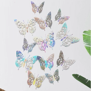 Detail of 12 hollow 3D butterfly wall stickers with rainbow holographic metallic finish
