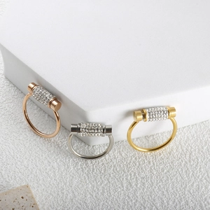 Elegant rotating bar rings in gold, silver and rose gold with clear pavé crystals