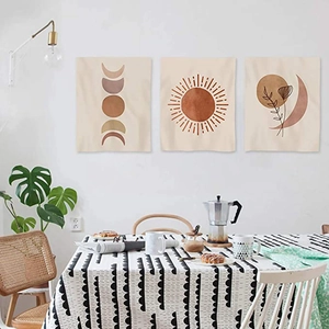 3-piece Bohemian wall tapestry set with sun and moon phases on a cozy dining room wall