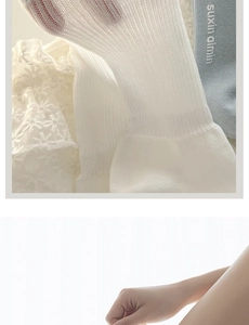 Macro detail of breathable sheer mesh socks with suxin aimin letter print design