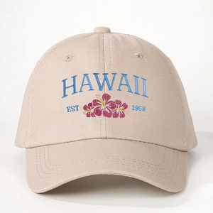 Beige washed cotton baseball cap with blue Hawaii EST 1959 floral embroidery design