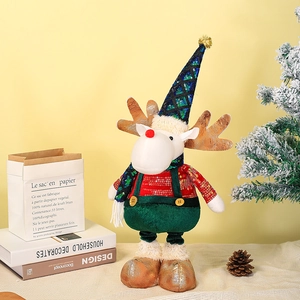 Charming plush Christmas reindeer doll with sequins in a festive home decor setting