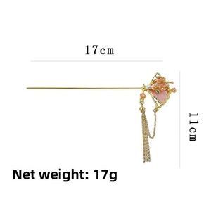 Dettaglio forcina cinese a ventaglio con decoro floreale e peso netto di 17g