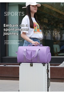 Purple travel bag with trolley sleeve attachment shown on a white suitcase handle