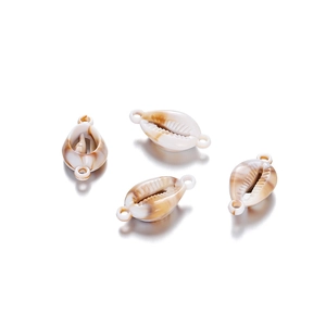 Detailed view of white and brown scallop shell acrylic charms with double-hole design