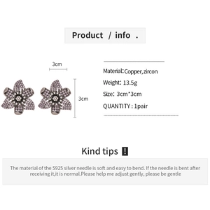 Detail view of purple zircon flower earrings with S925 silver needle and copper material